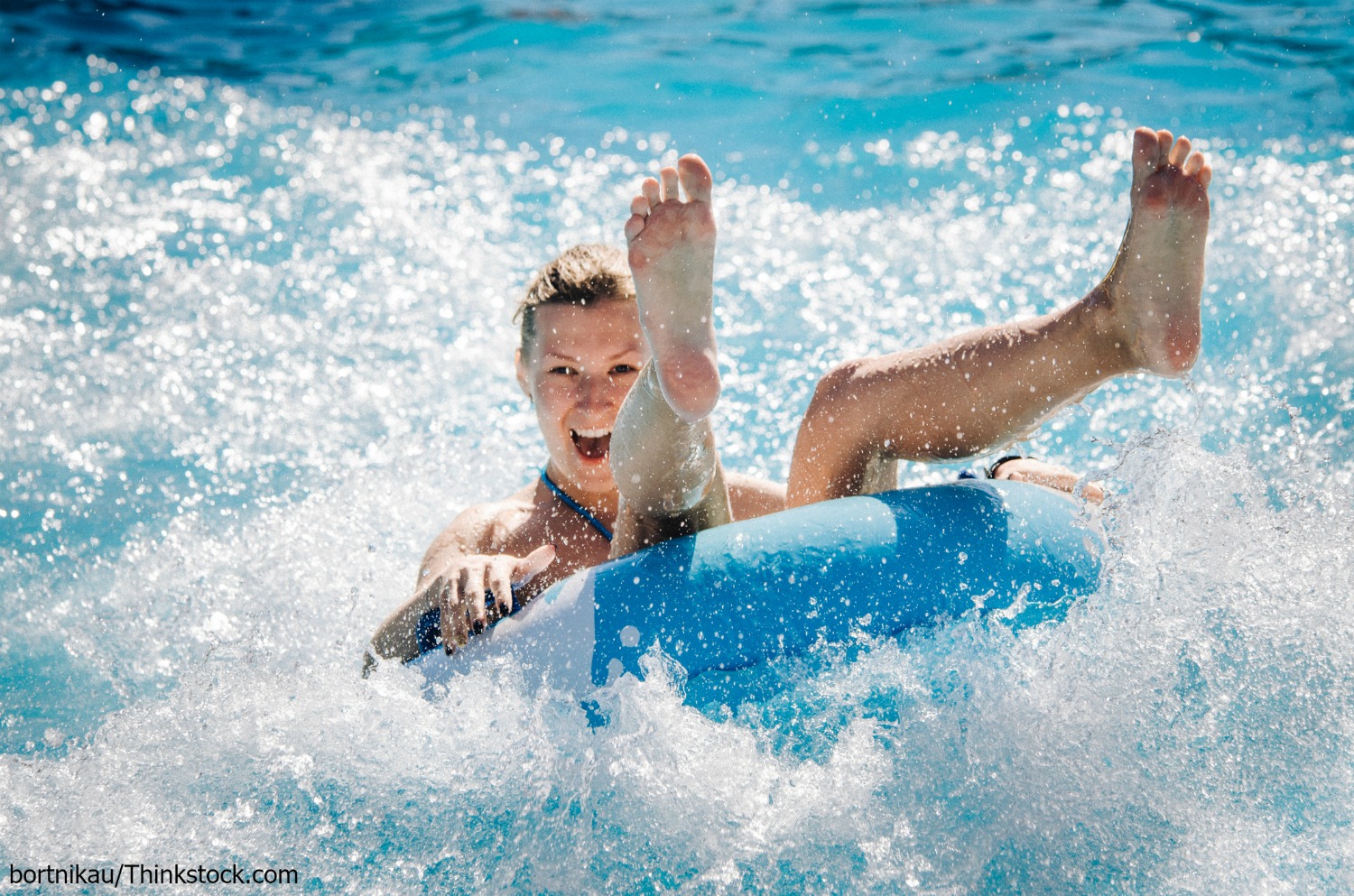 girl rafting at water park